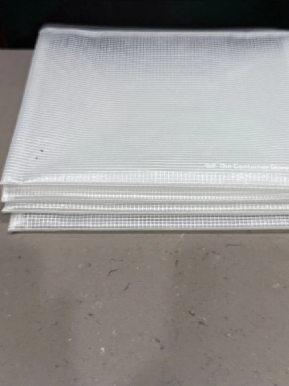 The Container Store Mesh Pouches with Zipper.  Approx 7.5” L & 9.5” W